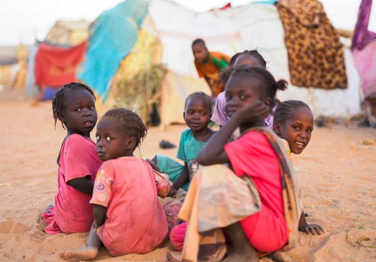 Displaced Sudanese children who fled with their families during violence in al-Fashir, sit inside a camp shelter, amid ongoing clashes between the paramilitary Rapid Support Forces (RSF) and the Sudanese army, in Tawila, North Darfur, Sudan November 3, 2025. REUTERS/Mohamed Jamal