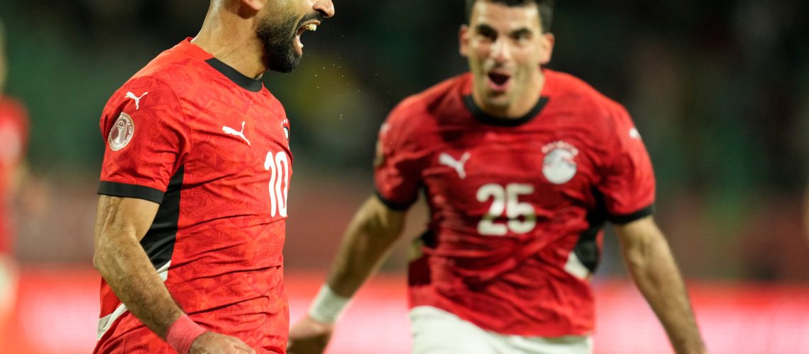 Egypt's Mohamed Salah celebrates after scoring his side's third goal during the Africa Cup of Nations round of 16 soccer match between Egypt and Benin in Agadir, Morocco, Monday, Jan. 5, 2026. (AP Photo/Mosa'ab Elshamy)